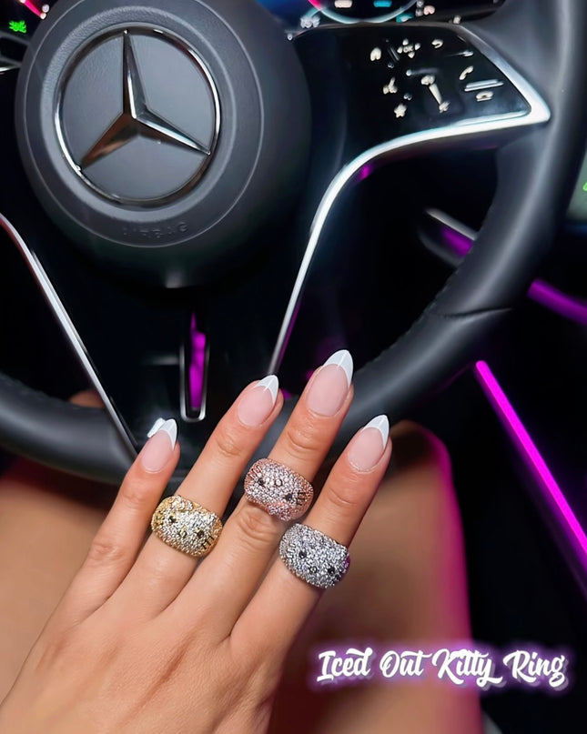Iced out kitty ring